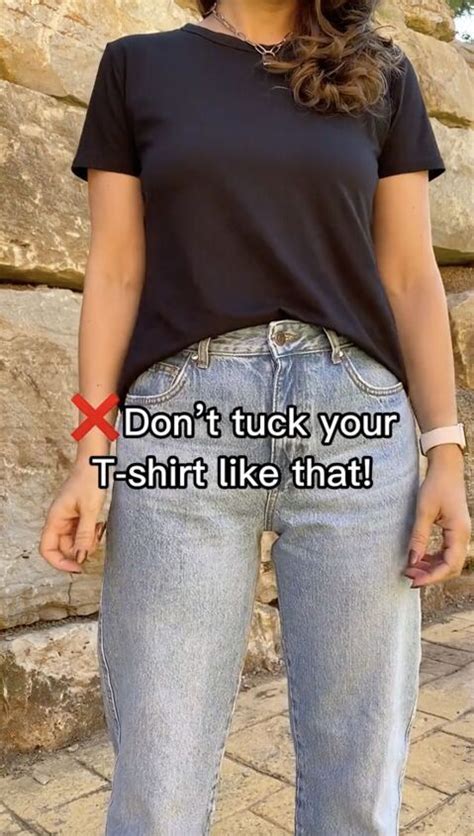 tuck t-shirt into jeans.